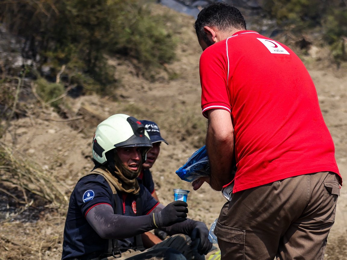 Amid record heat, Southern Europe battles wildfires from the air and on land